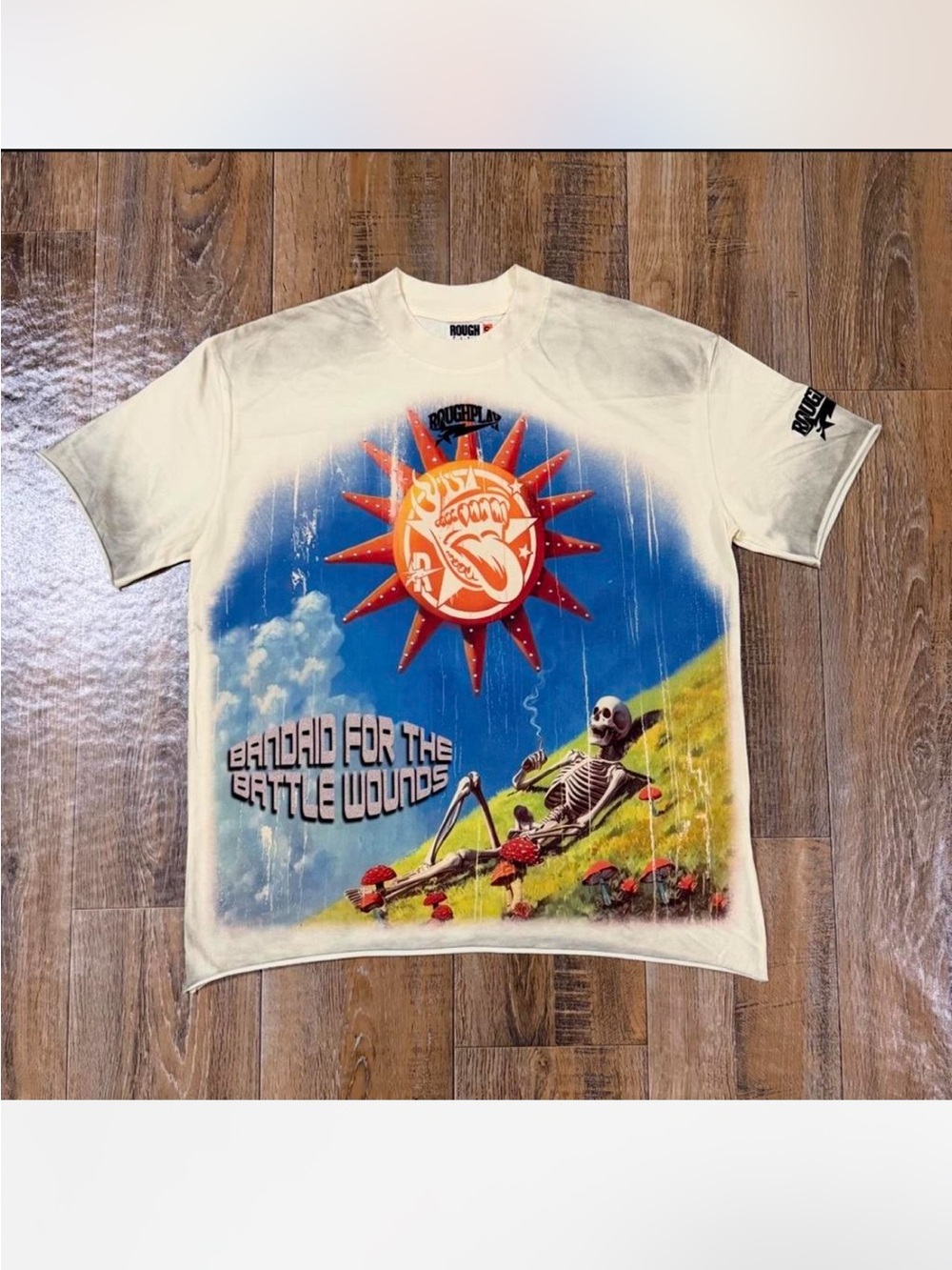 'Roughplay Bandage For The Battle Wounds' Graphic Tee - Cream/Blue